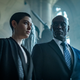 Asia Kate Dillon (as the Adjudicator) and Lance Reddick (as Charon).